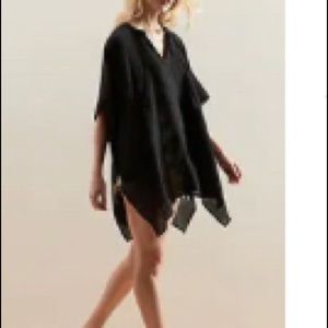 Bathing suit cover up or light weight poncho in black.